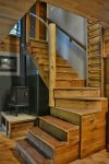 Custom cherry stairs to match, and a woodstove to keep the chill out.  